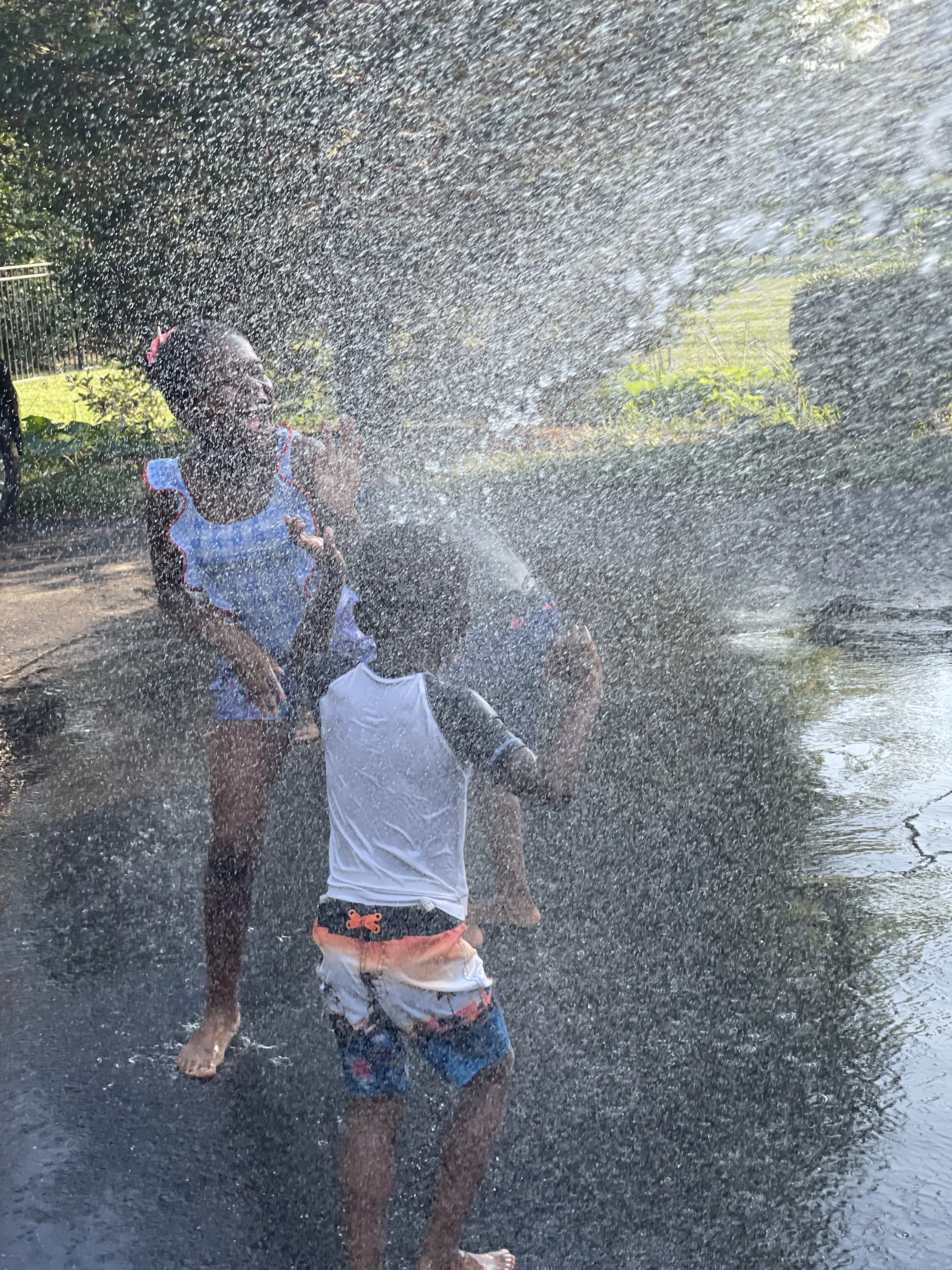 Keep dancing in sprinkling water on hot days!